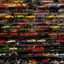 die-cast car collection on rack